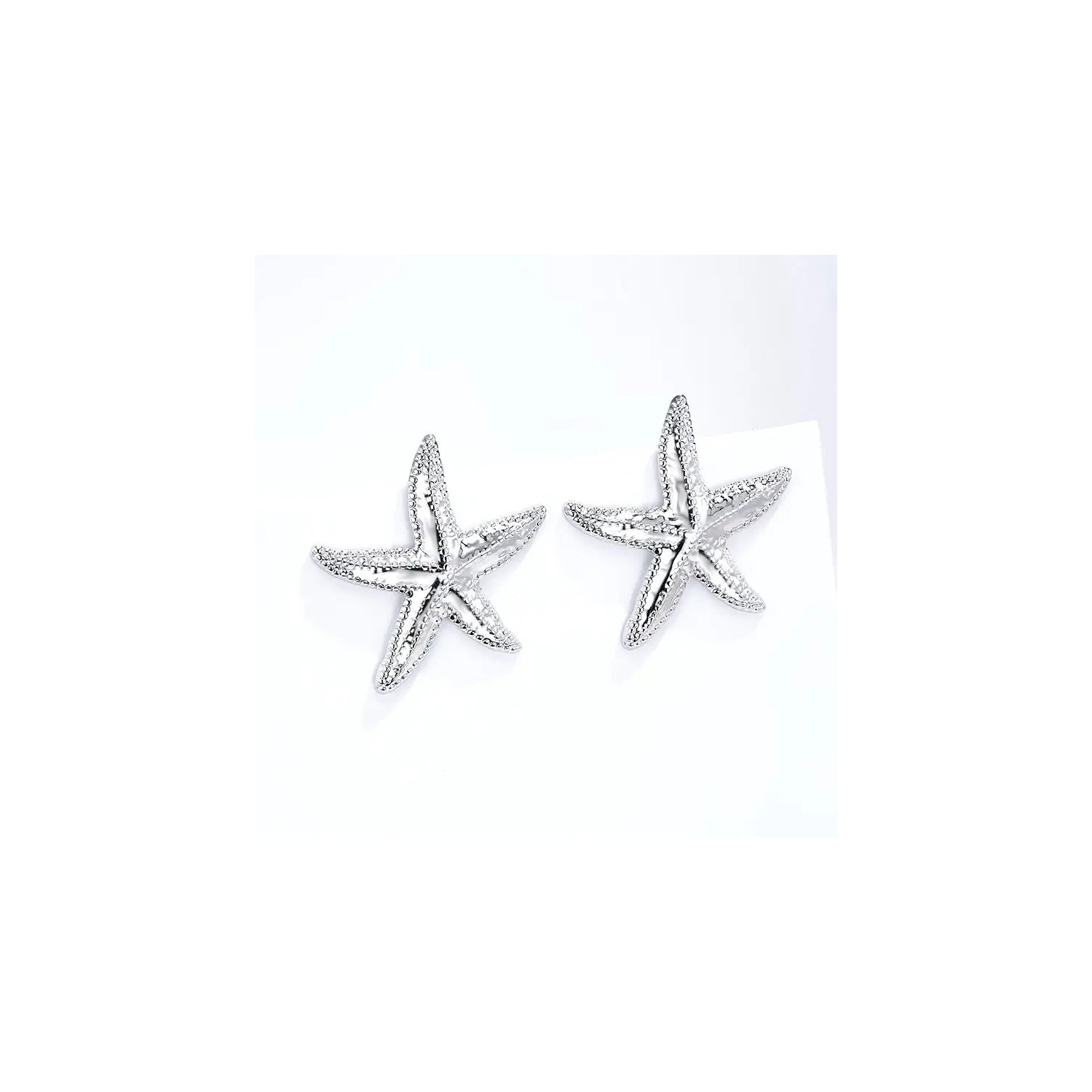 Boucles d’oreilles étoile acier inoxydable | Chère Colette