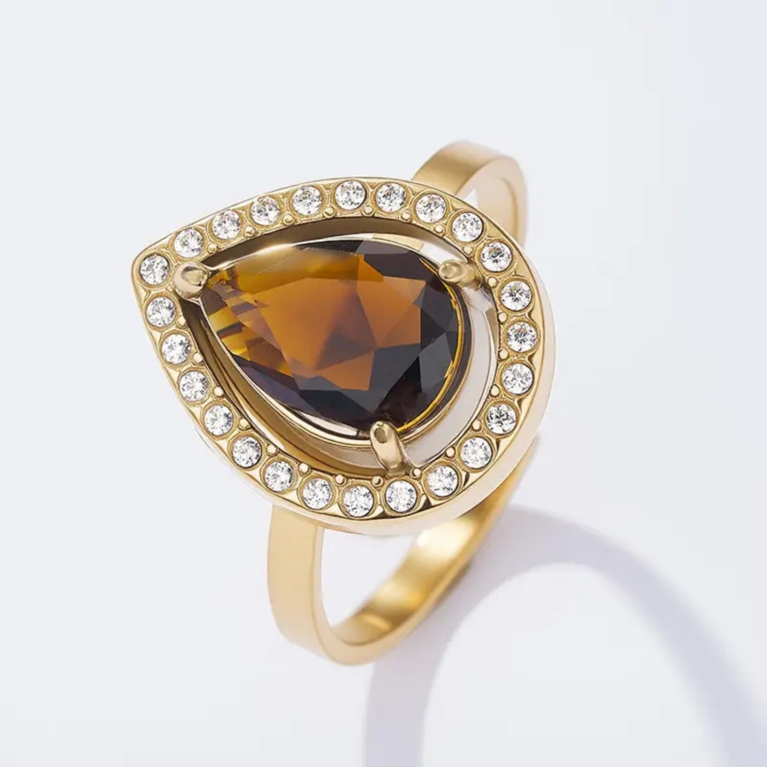 Bague goutte ambrée halo doré